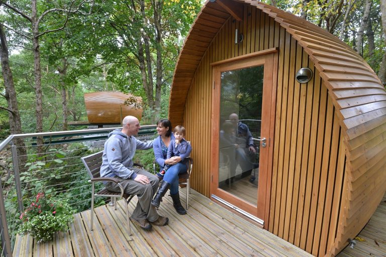 Happy Glampers at a Glamping Pod.